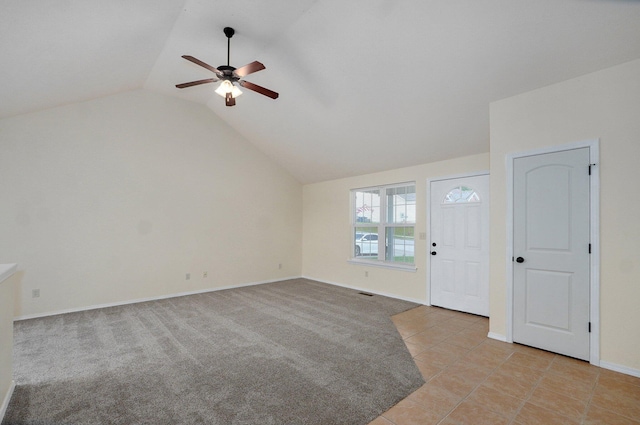 612-614 E Daniels St, Ozark, MO 65721 - foyer featuring ceiling fan, vaulted ceiling, baseboards, light tile patterned floors, and light carpet