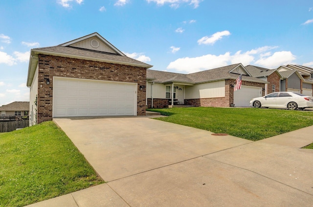 612-614 E Daniels St, Ozark, MO 65721 - ranch-style house with brick siding, a front lawn, concrete driveway, an attached garage, and board and batten siding