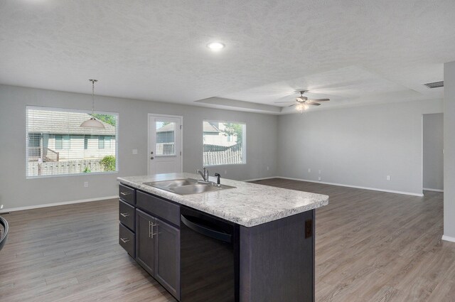1366 S Olde Savannah Ave, Republic, MO 65738 - kitchen featuring dishwashing machine, a sink, ceiling fan, baseboards, and light countertops