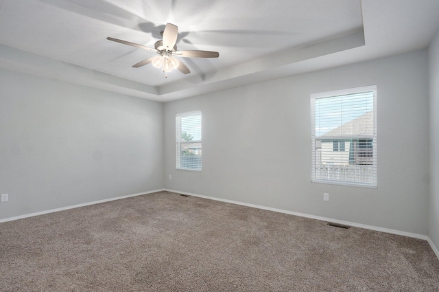 1366 S Olde Savannah Ave, Republic, MO 65738 - carpeted spare room with a raised ceiling, ceiling fan, and baseboards