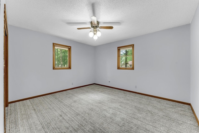 1061 Brentwood Dr, Marshfield, MO 65706 - unfurnished room with a ceiling fan, carpet, a textured ceiling, and baseboards