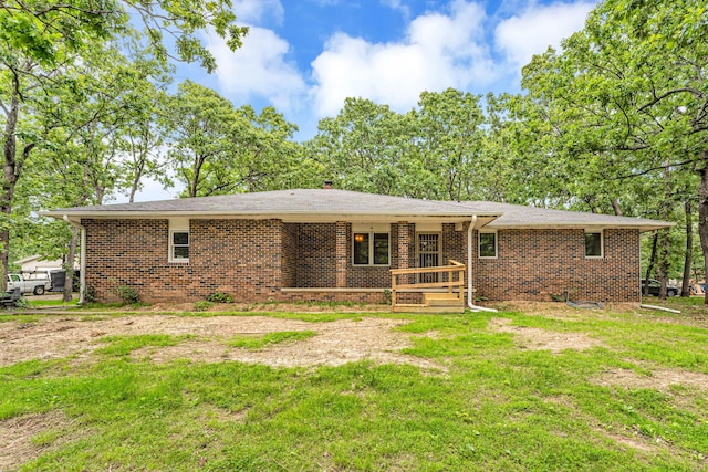 1061 Brentwood Dr, Marshfield, MO 65706 - back of house with brick siding and a yard