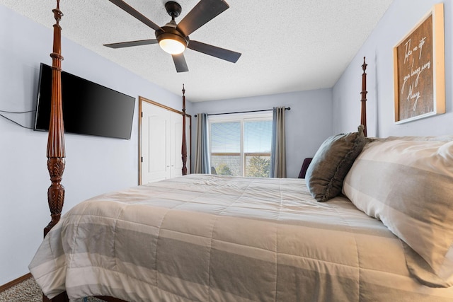 45 James View Rd, Kimberling City, MO 65686 - bedroom with a textured ceiling, a ceiling fan, and a closet