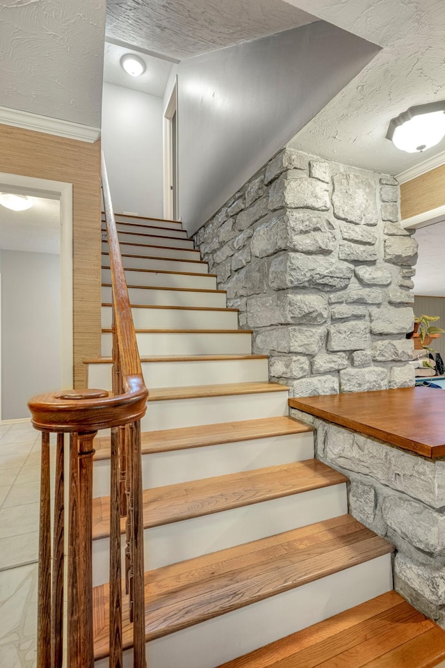 2215 E Rosebrier St, Springfield, MO 65804 - staircase featuring a textured ceiling and tile patterned flooring