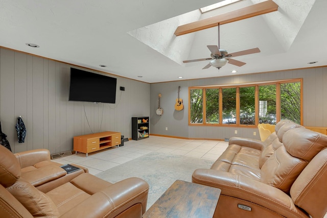 2215 E Rosebrier St, Springfield, MO 65804 - living area with light tile patterned flooring, a skylight, ceiling fan, crown molding, and recessed lighting