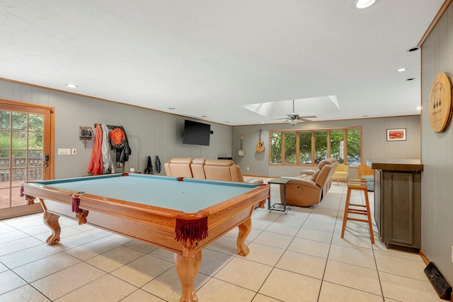 2215 E Rosebrier St, Springfield, MO 65804 - recreation room with a skylight, light tile patterned floors, billiards table, recessed lighting, and wood walls