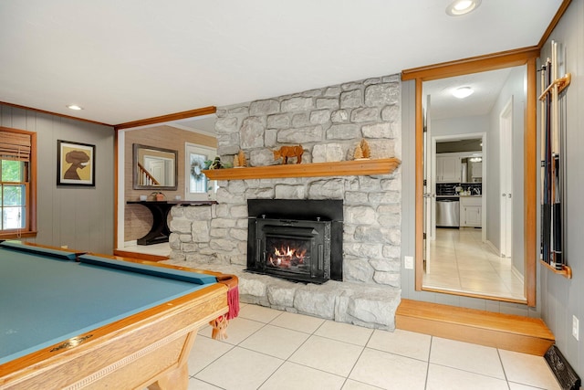 2215 E Rosebrier St, Springfield, MO 65804 - game room with tile patterned flooring, a stone fireplace, ornamental molding, plenty of natural light, and billiards