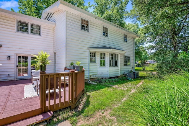 2215 E Rosebrier St, Springfield, MO 65804 - back of property with a deck and a lawn