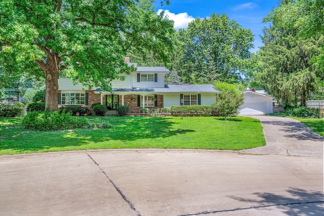 2215 E Rosebrier St, Springfield, MO 65804 - traditional-style house featuring a garage, a front lawn, and brick siding