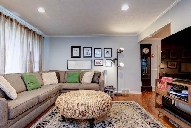2344 E Manchester St, Springfield, MO 65804 - living area with ornamental molding, baseboards, wood finished floors, and recessed lighting