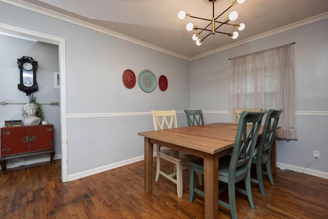 2344 E Manchester St, Springfield, MO 65804 - dining room with a chandelier, crown molding, wood finished floors, and baseboards