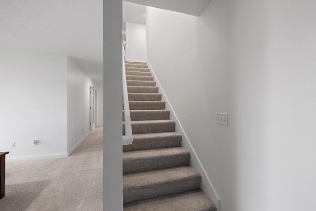 1118 E Lakota St, Nixa, MO 65714 - staircase featuring baseboards and carpet