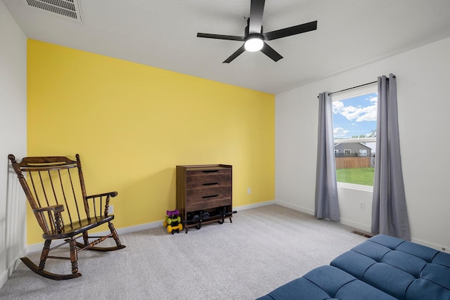 1118 E Lakota St, Nixa, MO 65714 - sitting room with ceiling fan, carpet floors, and baseboards