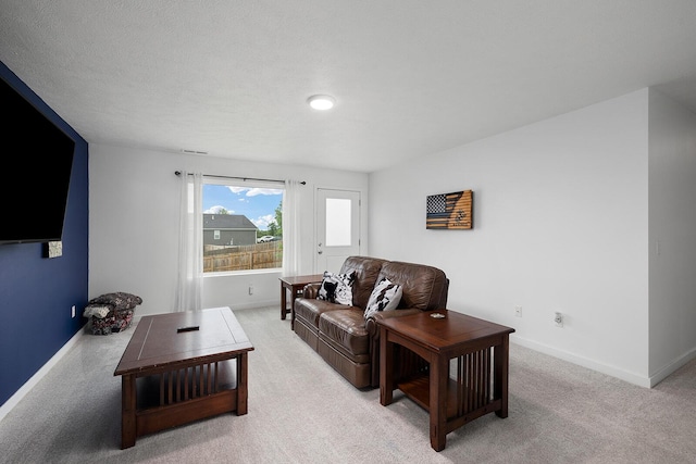 1118 E Lakota St, Nixa, MO 65714 - living room with light carpet and baseboards