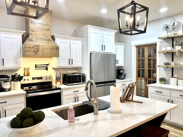 2702 Town Dr, Mountain Grove, MO 65711 - kitchen featuring stainless steel appliances, a sink, open shelves, white cabinetry, and recessed lighting