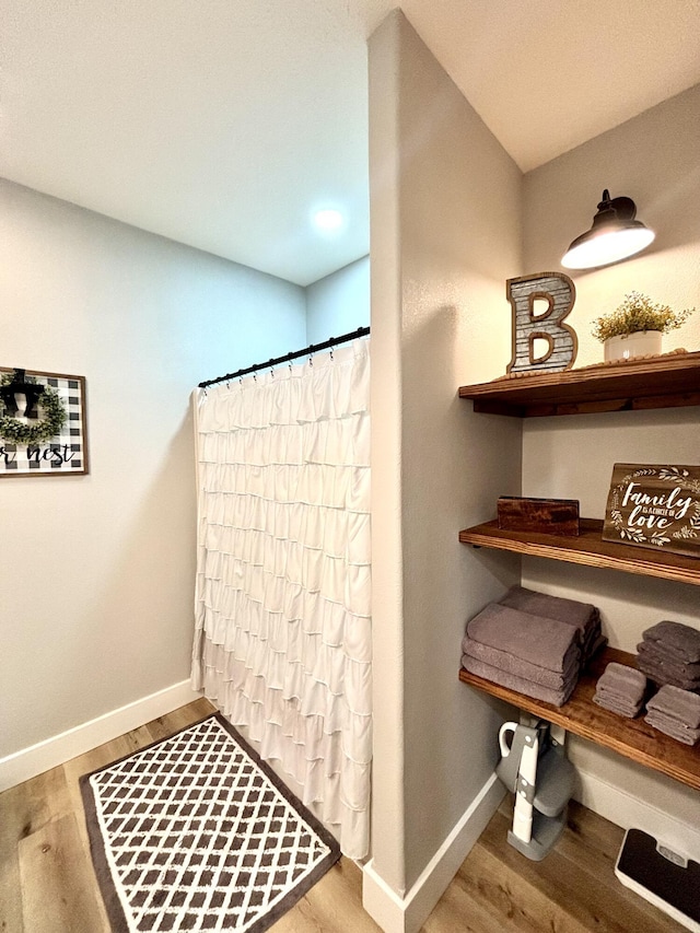 2702 Town Dr, Mountain Grove, MO 65711 - detailed view of baseboards and wood finished floors