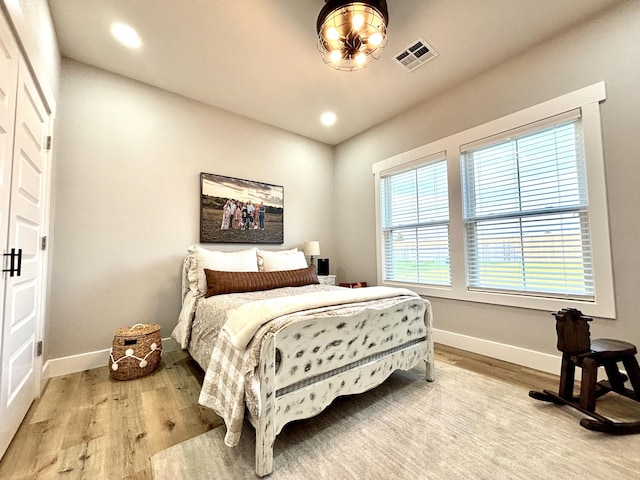2702 Town Dr, Mountain Grove, MO 65711 - bedroom featuring light wood-type flooring, baseboards, and recessed lighting