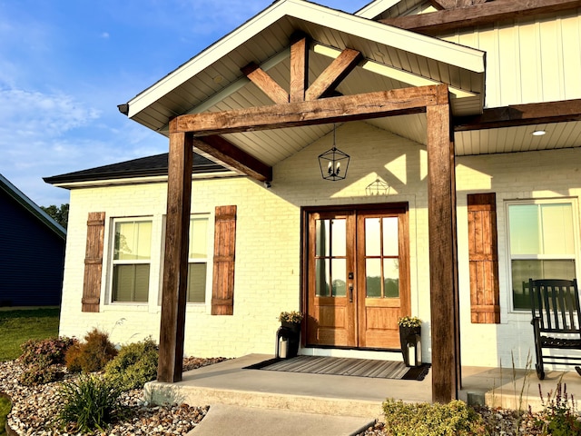2702 Town Dr, Mountain Grove, MO 65711 - view of exterior entry with french doors and brick siding