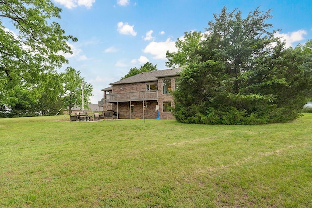 11976 N Northern Hts Dr, Brighton, MO 65617 - view of green lawn with a wooden deck