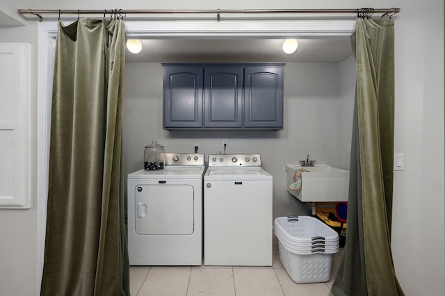 11976 N Northern Hts Dr, Brighton, MO 65617 - laundry room featuring separate washer and dryer, cabinet space, and light tile patterned floors