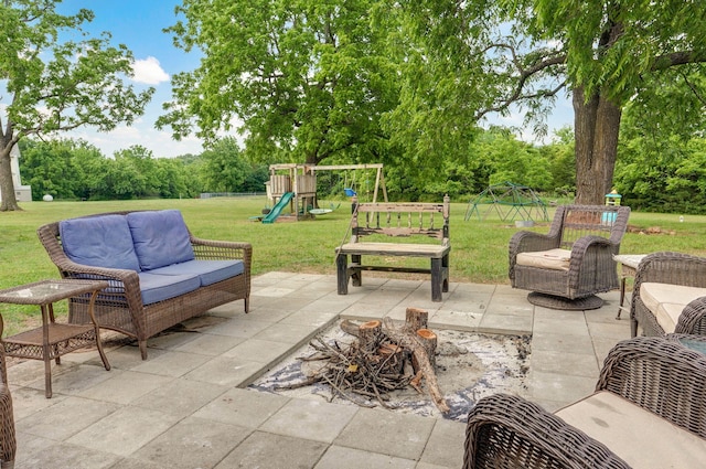 11976 N Northern Hts Dr, Brighton, MO 65617 - view of patio featuring a playground, an outdoor hangout area, and view of wooded area