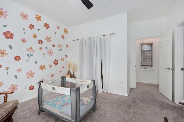 11976 N Northern Hts Dr, Brighton, MO 65617 - carpeted bedroom featuring baseboards, wallpapered walls, and ceiling fan