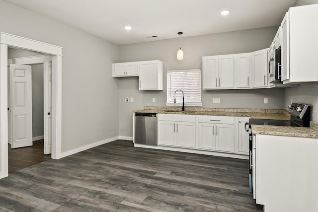 111 S Mill St, Rogersville, MO 65742 - kitchen with appliances with stainless steel finishes, a sink, white cabinetry, dark wood finished floors, and recessed lighting
