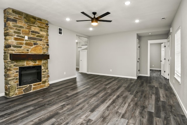 111 S Mill St, Rogersville, MO 65742 - unfurnished living room featuring ceiling fan, wood finished floors, a stone fireplace, baseboards, and recessed lighting