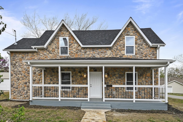 111 S Mill St, Rogersville, MO 65742 - view of front of property featuring stone siding, a porch, and roof with shingles
