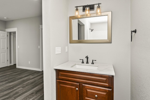 111 S Mill St, Rogersville, MO 65742 - bathroom featuring vanity, wood finished floors, and baseboards