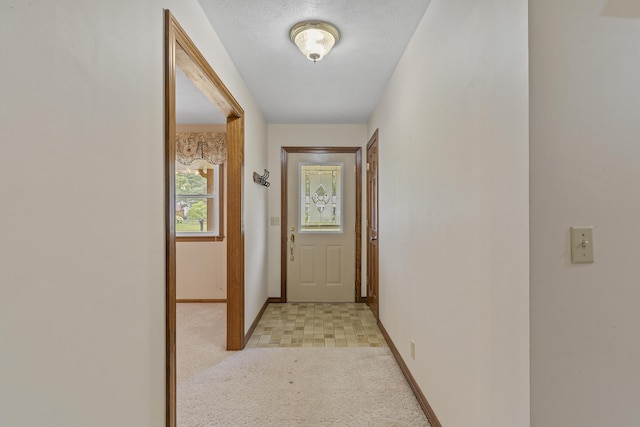 5263 N Crestwood Dr, Springfield, MO 65803 - entryway with baseboards and light colored carpet