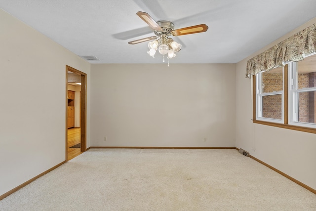 5263 N Crestwood Dr, Springfield, MO 65803 - unfurnished room with light carpet and a ceiling fan