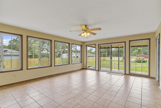5263 N Crestwood Dr, Springfield, MO 65803 - unfurnished sunroom with tile patterned floors