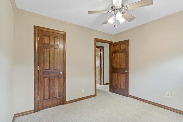 5263 N Crestwood Dr, Springfield, MO 65803 - unfurnished bedroom featuring carpet, ornamental molding, and ceiling fan