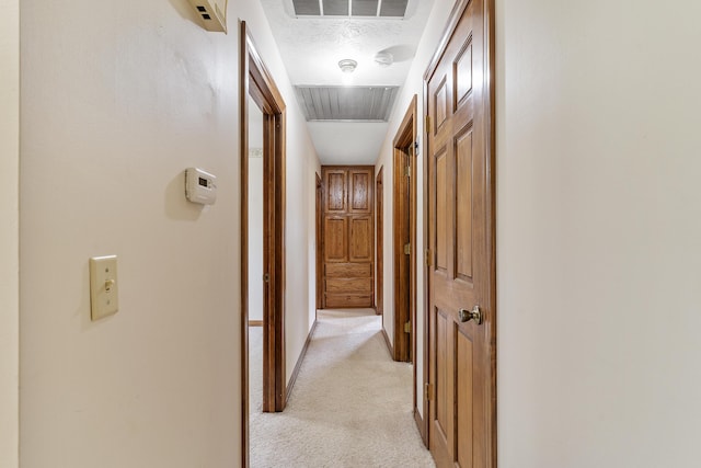 5263 N Crestwood Dr, Springfield, MO 65803 - hall with light carpet and attic access