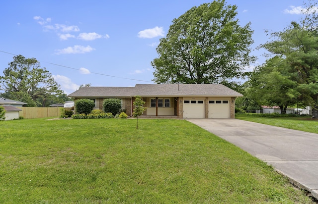 5263 N Crestwood Dr, Springfield, MO 65803 - view of front of property featuring a garage, driveway, and brick siding