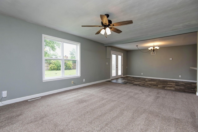 5364 Cloverdale Ln, Battlefield, MO 65619 - carpeted spare room with baseboards, a chandelier, and a ceiling fan