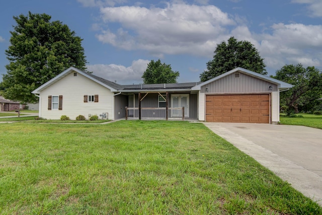 5364 Cloverdale Ln, Battlefield, MO 65619 - ranch-style home with a garage, a front yard, concrete driveway, board and batten siding, and a porch