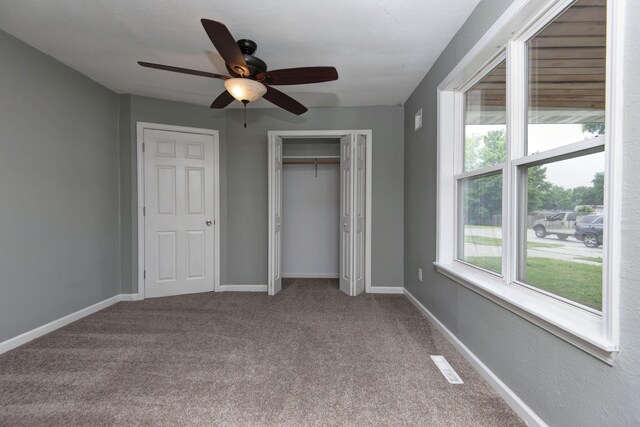5364 Cloverdale Ln, Battlefield, MO 65619 - unfurnished bedroom featuring carpet, a closet, ceiling fan, and baseboards