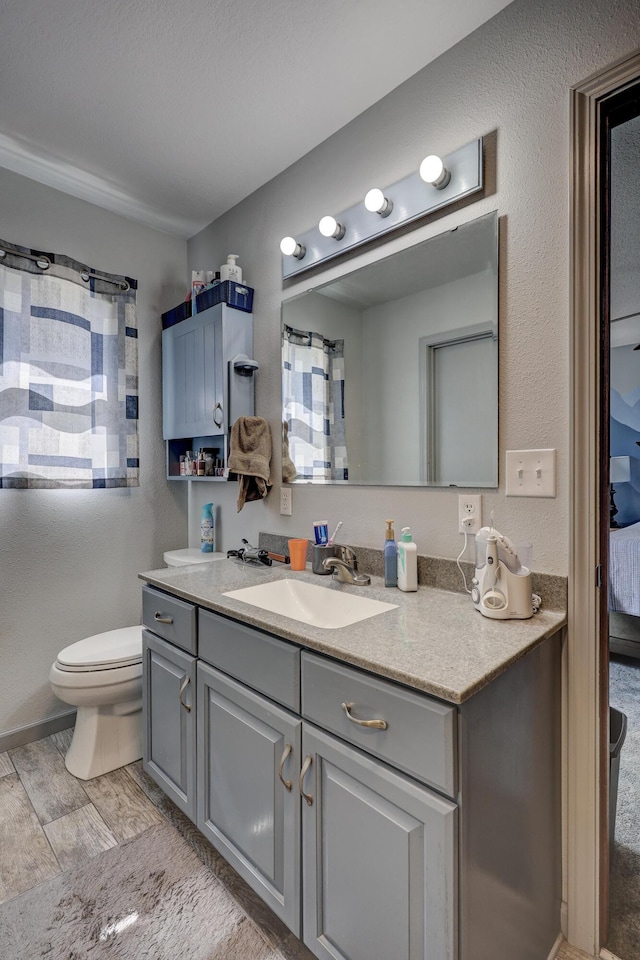 1631 Robertson Ave, Carthage, MO 64836 - full bath featuring vanity and toilet