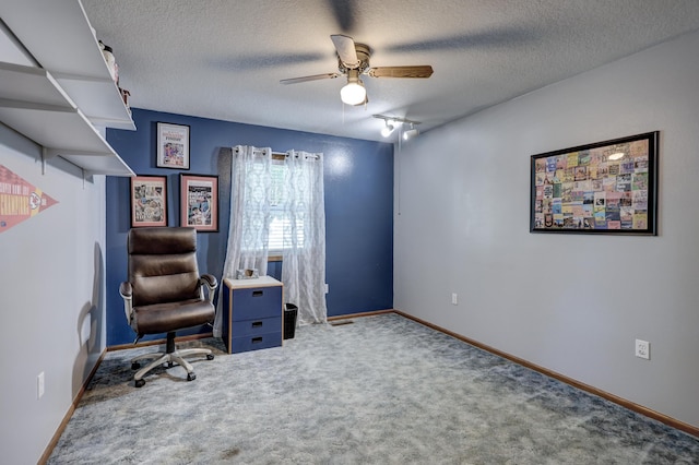 1631 Robertson Ave, Carthage, MO 64836 - office area featuring a ceiling fan, a textured ceiling, carpet flooring, and baseboards