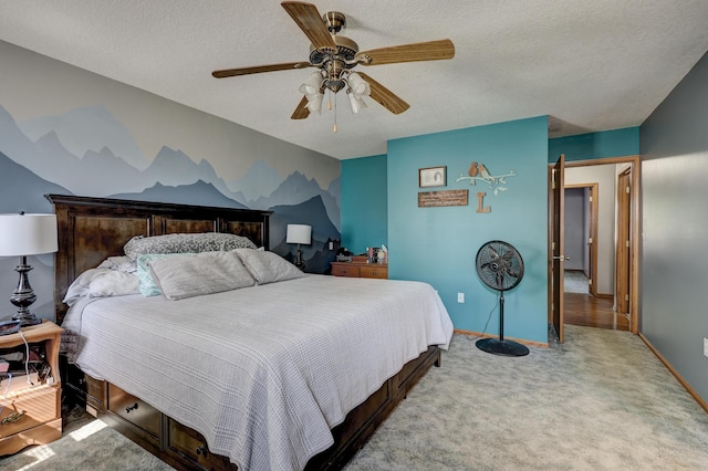 1631 Robertson Ave, Carthage, MO 64836 - bedroom with a textured ceiling, carpet floors, baseboards, and ceiling fan