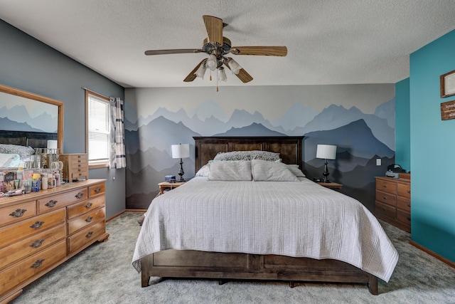 1631 Robertson Ave, Carthage, MO 64836 - bedroom with carpet floors, a textured ceiling, a ceiling fan, and baseboards