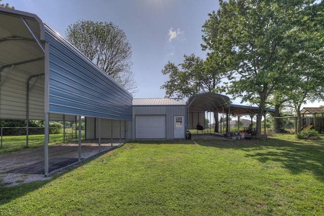 1631 Robertson Ave, Carthage, MO 64836 - view of yard featuring a garage and an outbuilding