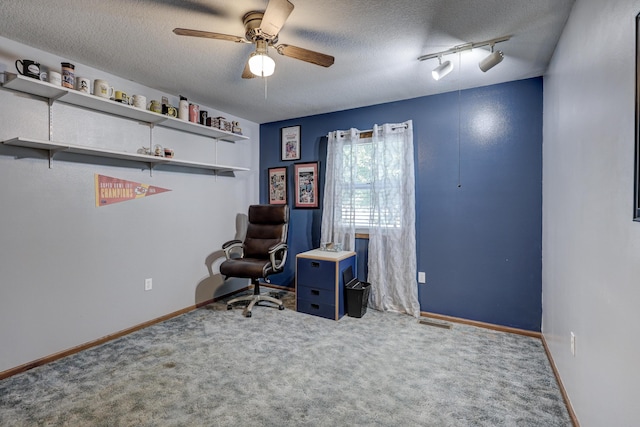 1631 Robertson Ave, Carthage, MO 64836 - carpeted office space featuring ceiling fan, a textured ceiling, and baseboards
