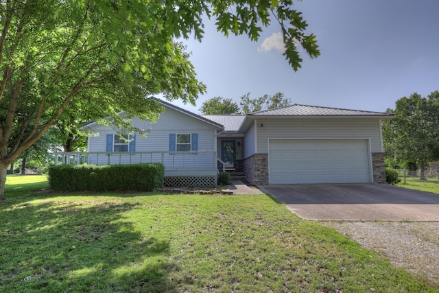 1631 Robertson Ave, Carthage, MO 64836 - ranch-style home with driveway, a garage, a front lawn, metal roof, and stone siding