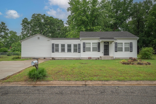 2339 Xenia St, Joplin, MO 64801 - view of front of house featuring a front yard, view of wooded area, and crawl space
