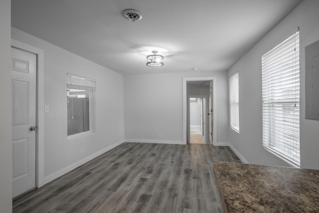 2339 Xenia St, Joplin, MO 64801 - empty room featuring wood finished floors and baseboards