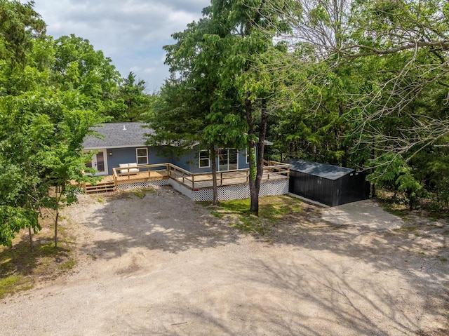 3050 Montague Ln, Kimberling City, MO 65686 - view of front facade featuring a wooden deck