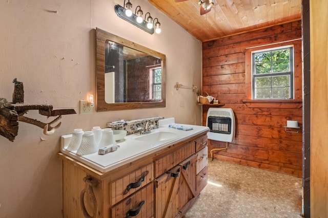 447 Flint Ln, Washburn, MO 65772 - bathroom featuring heating unit, wooden ceiling, vanity, wood walls, and tile patterned floors